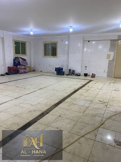 Ground floor space suitable for a food business, 180 square meters, for rent in the industrial area of ​​Fifth Settlement.