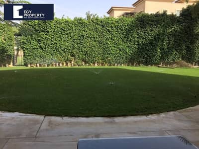 With a Prime View Apartment With a Private Garden for Sale in Lake View - New Cairo