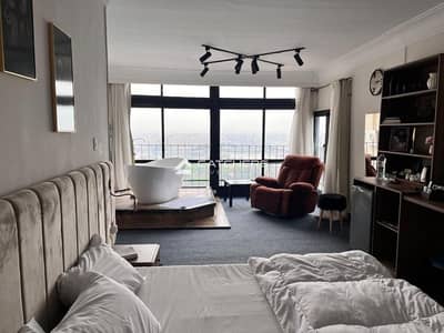 Intercontinental hotel apartments for sale directly on the Nile, fully finished with furniture, air conditioning, and appliances.