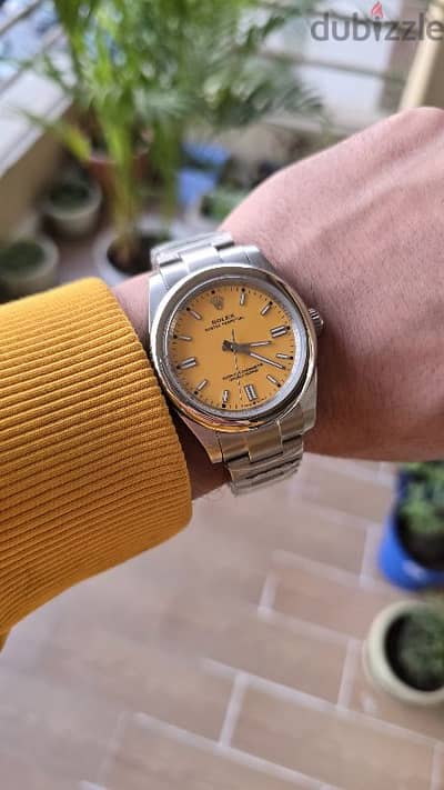 Rolex Yellow watch