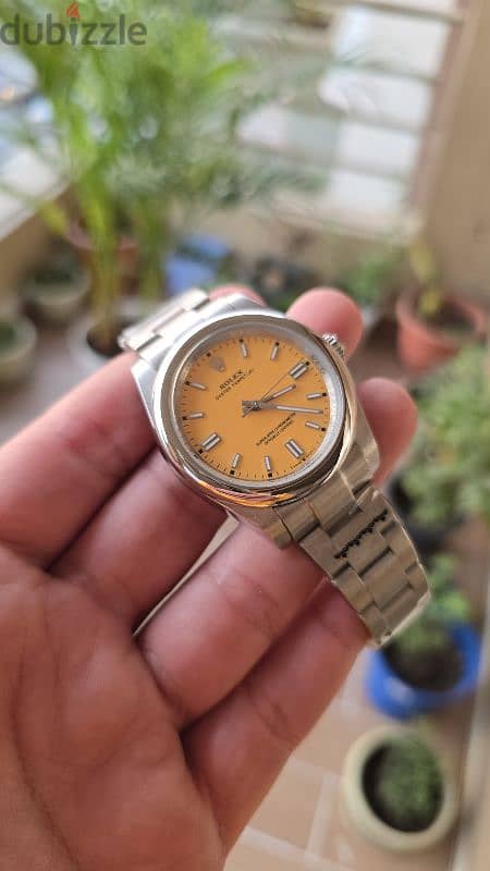 Rolex Yellow watch 4