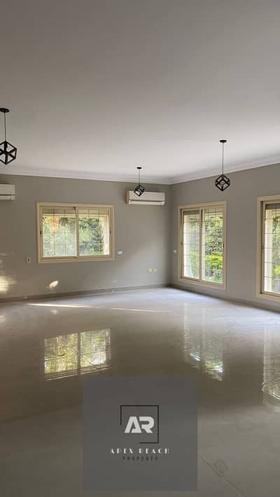 Villa for rent semi-furnished with kitchen and air conditioning, special finishes in Flowers Park compound in front of Al Rehab directly - First Settlement - New Cairo