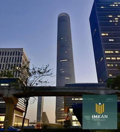مكتب اداري للبيع متشطب بالكامل بالتكيفات بالتقسيط علي 10 سنوات أمام البرج الأيقوني مباشرة في تاج تاور TAJ TOWER في منطقه CBD