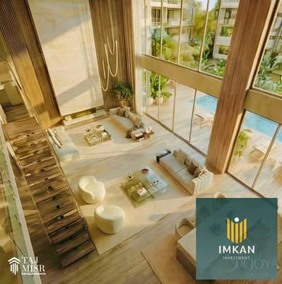 A villa with a swimming pool for sale in installments over 15 years, located in R8B, Dejoia 4, New Administrative Capital, Dejoia, Cairo.