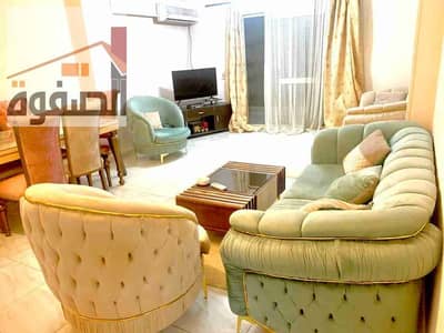 Apartment for daily rent for families and families in Baron City Compound next to the Sporting Club and the Ring Road, close to all services, a distinguished and upscale location