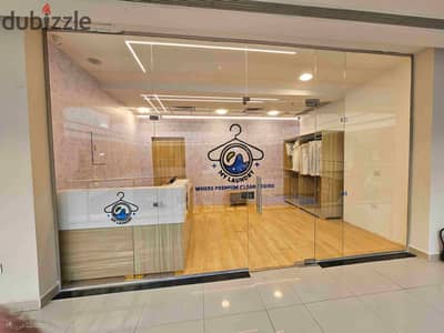 Commercial store for sale on the first floor rented with a monthly return Sheikh Zayed City