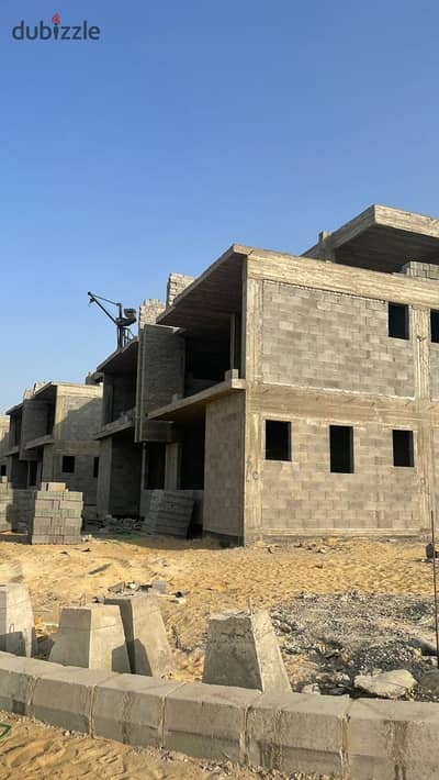Ground floor apartment for sale with a large garden in Sheikh Zayed at the lowest price in Levels Dunes compound