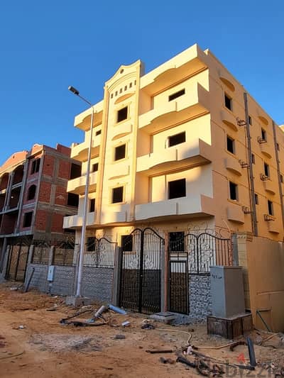 عمارة كاملة بالتوسعات الشمالية