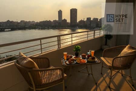امتلك جناح فندقي VIP بإطلالة على النيل والأهرامات في ريف دو نيل { Reve du nil } | تشطيب كامل بالاجهزة | المعادي | بجوار فندق هيلتون