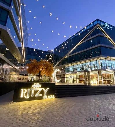 Fully finished shop with air conditioners in Ritzy Mall the heart of El Sheikh Zayed next to Islamic Center and near Arkan Plaza