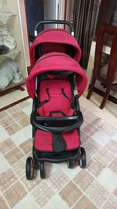 عربه أطفال توام