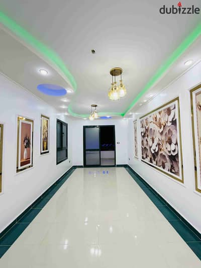 Apartment in Al-Ajami, Palm Beach, on a main street, entrance number 2 for Palm, distinguished residential and tourist location