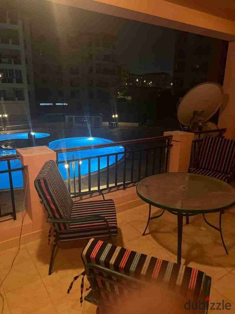 Directly by the pool of Dream Land Compound, a furnished rental ...