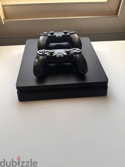 PlayStation 4 with 2 controllers 1Tb
