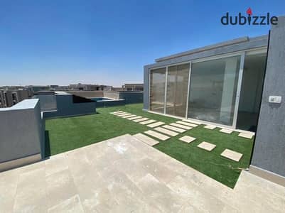 Apartment 152m² with a 128m² roof terrace, ready for immediate occupancy, with installments over 8 years, for sale in a compound in New Cairo.