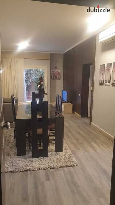 شقة أرضي بحديقة خاصة للبيع في كمبوند فيليدج جيت – القاهرة الجديدة