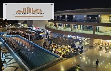 Distinct 210m shop for rent at Central Avenue Mall in front of Americana Plaza on the facade