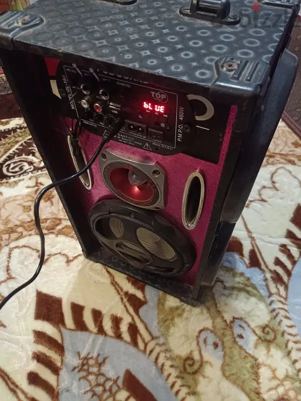 Two sets of large speakers for sale, each with a remote control