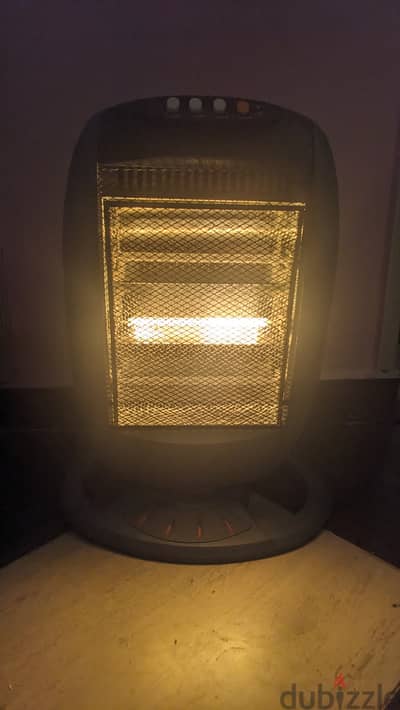 دفاية هالوجين قدرة 1200 وات، بتلف 180°.   Halogen home heater 1200W he