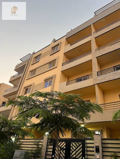 Apartment for sale in Lotus North, with one-year payment plans available. Panoramic view, open garden, on a main street. Mountain View 2 full landscap
