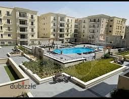 شقه لايجار  2 نوم مفروشه  الترا سوبر مودرن فيو مميز على حمام سباحه فى in Boulevard Mivida Emar