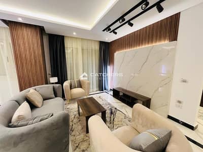 A fully finished apartment with air conditioning and a kitchen, ready for immediate occupancy, is for sale in Compound La Capital, Pyramids, New Admin