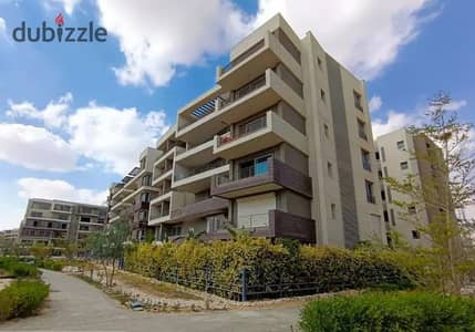 Directly overlooking the lagoon, a two-bedroom apartment with immediate occupancy, down payment and installments available, for sale in Palm Hills New