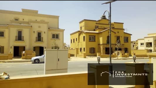 Twin house, finished, for sale at a price lower than an apartment in Mivida Parcel 7 compound, for less than market price.