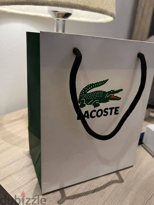 silver Lacoste 4