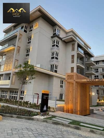Ground floor apartment with garden, immediate occupancy, for sale at the lowest price - in Mountain View iCity, New Cairo - Club Park phase Ground floor apartment with garden, immediate occupancy, for sale at the lowest price - in Mountain View iCity, New Cairo - Club Park phase