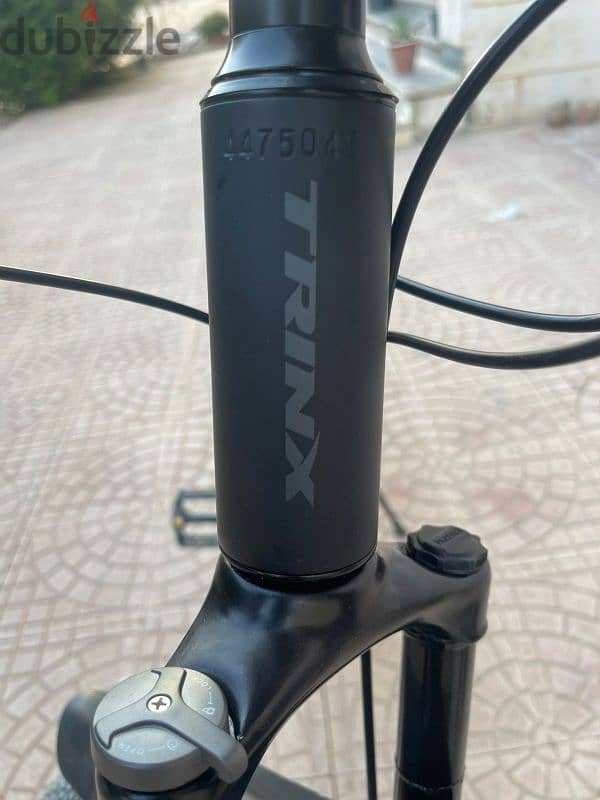 trinx m116 2