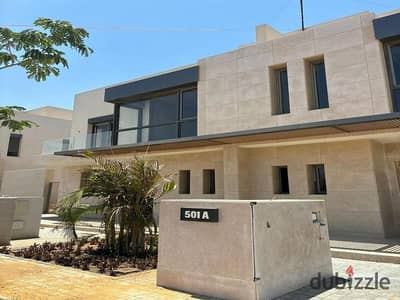 Immediate delivery twin house for sale in the best location with in Elkarma Gates compound, in the heart of Sheikh Zayed, facing Beverly Hills