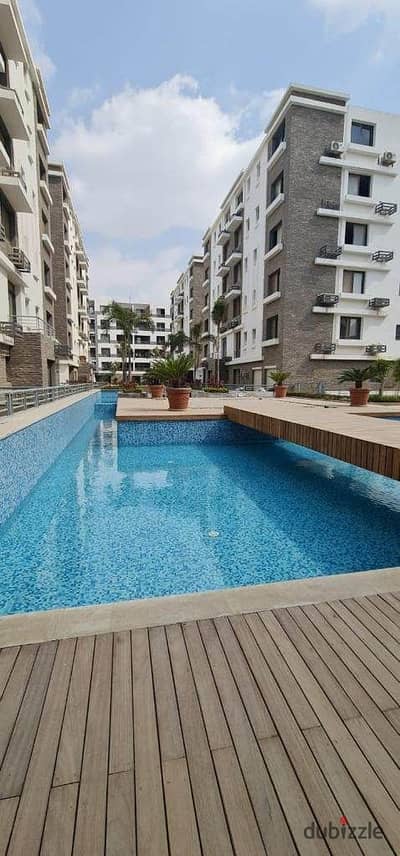 Apartment for sale in the Settlement, on the landscape, in the Taj City Compound, directly in front of the airport