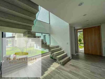 A villa at its original price, without any increase, ready for immediate viewing, fully finished with air conditioning.   Unit Type: Villa Area: 270 square meters For inquiries: 01012300642  The Marq Company has provided a state-of-the-art sports club and