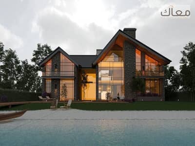 water villa behind auc in new cairo