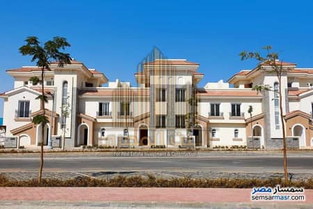 Twin house with special finishes for sale in Al Maqsad Compound, old contract