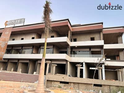 محل تجاري للبيع في حدايق اكتوبر استلام فوري بسعر لا يعوض
