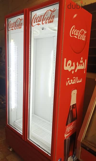 ثلاجه بابين متر وعشره جديده زيرو بالبلاستيك بتاعها تبريدها ممتاز جدا