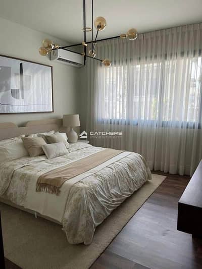 Immediate delivery, fully finished with 30% limited-time discount at The Address East, Golden Square, New Cairo. Prime location, lagoon & landscape vi