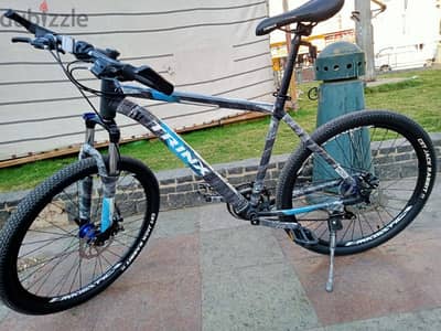TRINX m136جديده زيرووووو