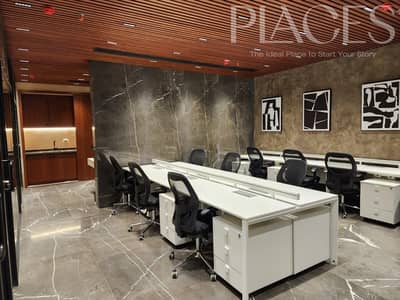 مكتب إداري للإيجار بموقع متميز في Mivida Business Park كامل التشطيب بالفرش الإداري، مناسب للشركات والمقار الإدارية