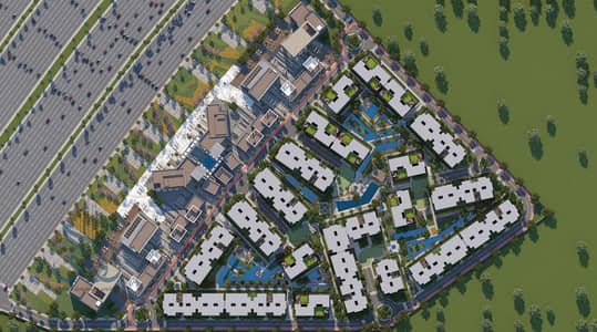 Apartment for sale with installments over 11 years on Al Wahat Road, opposite MSA University, at special prices.