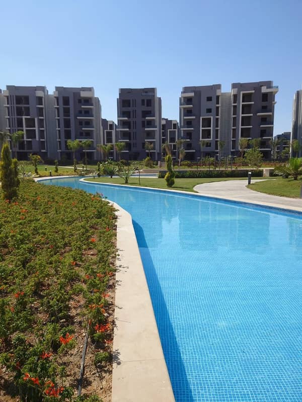 Ready for viewing Ground floor apartment with garden immediate delivery in Sun Capital located in the New Administrative Capital area with a landscape