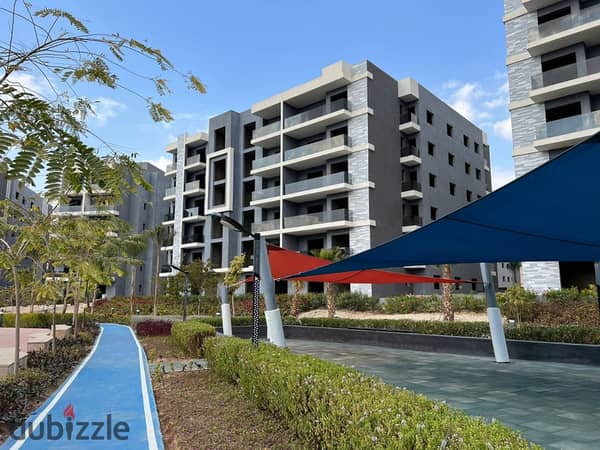 Ready for viewing Ground floor apartment with garden immediate delivery in Sun Capital located in the New Administrative Capital area with a landscape