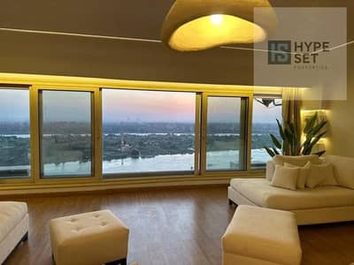 VIP hotel suite for sale, first row on the Nile , fully finished with furniture & appliances , in Maadi next to Hilton