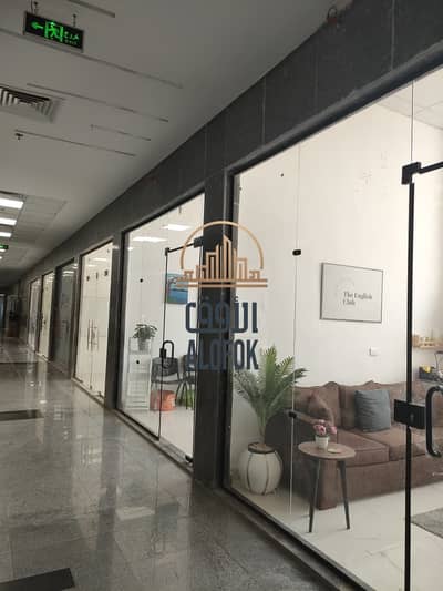 22 sqm office in a prestigious New Cairo mall – private parking & 24/7 security – Only 10,000