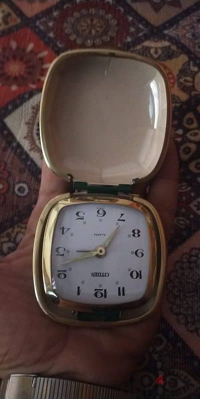 ساعه ومنبه سيتزن جديد