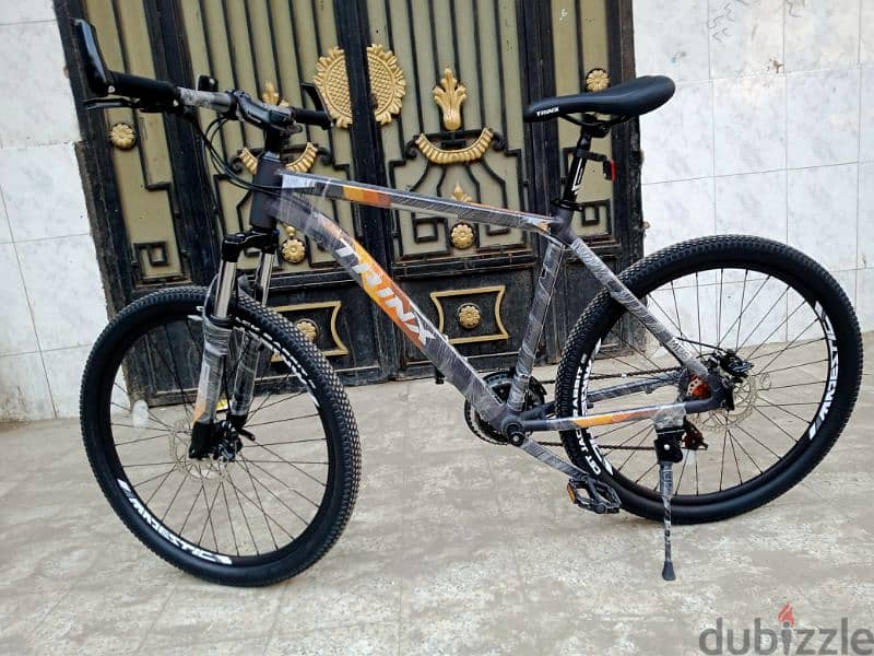 trinx m136 3