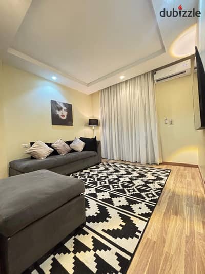 Apartment for rent fully furnished ground floor in the Address - Area 200m - Al Sheikh Zayed
