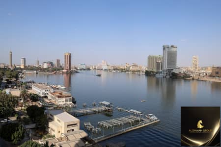 Luxury 4-Bedroom Hotel Apartment with Direct Nile View – Dokki, Cairo